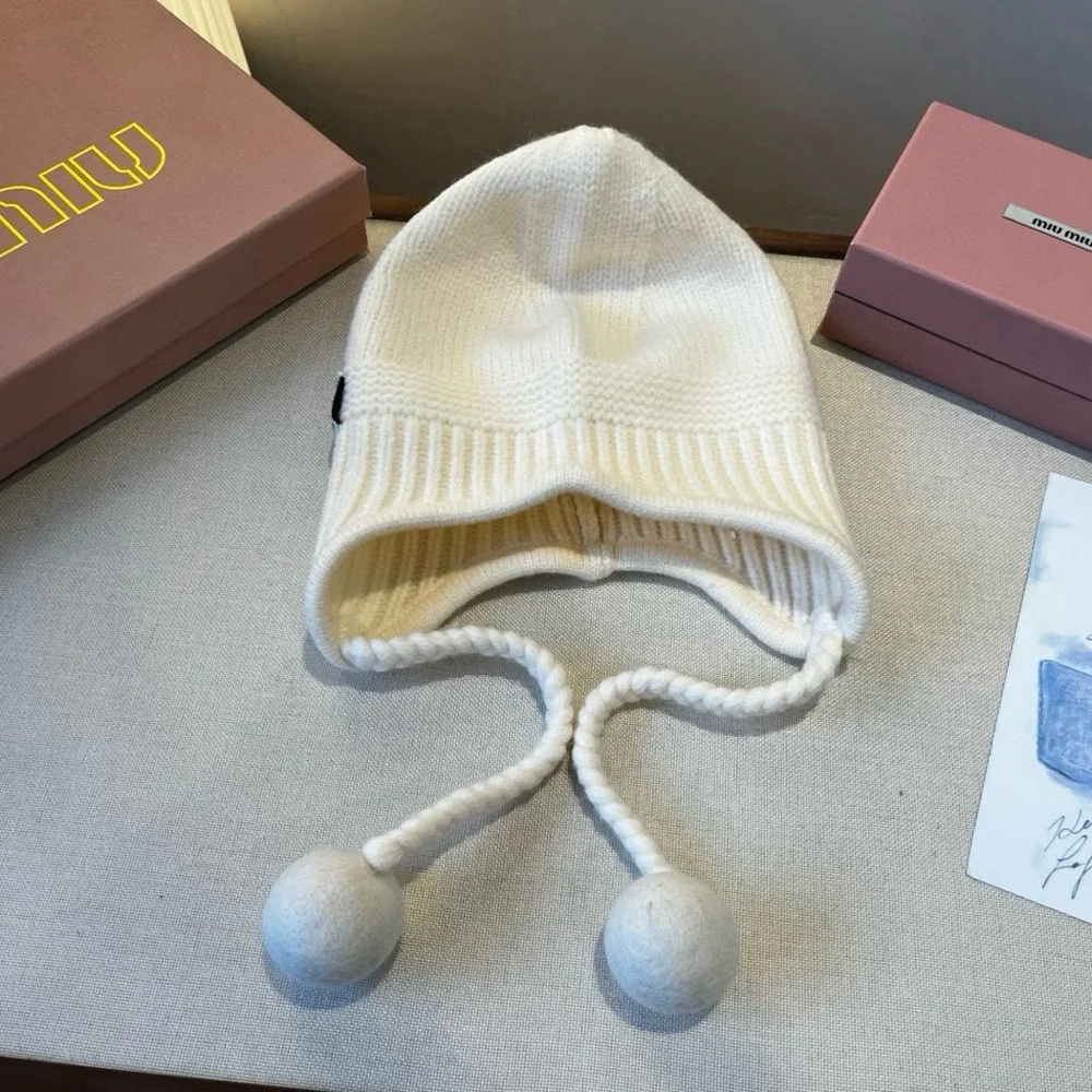 Miu Miu Cream Knit Hat with Pom Poms - Picture 5 of 6